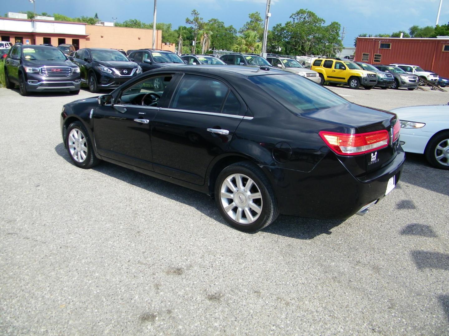 2011 Black /Black Lincoln MKZ FWD (3LNHL2GC0BR) with an 3.5L V6 DOHC 24V engine, 6-Speed Automatic transmission, located at 4000 Bee Ridge Road, Sarasota, FL, 34233, (941) 926-0300, 27.298664, -82.489151 - Photo#4